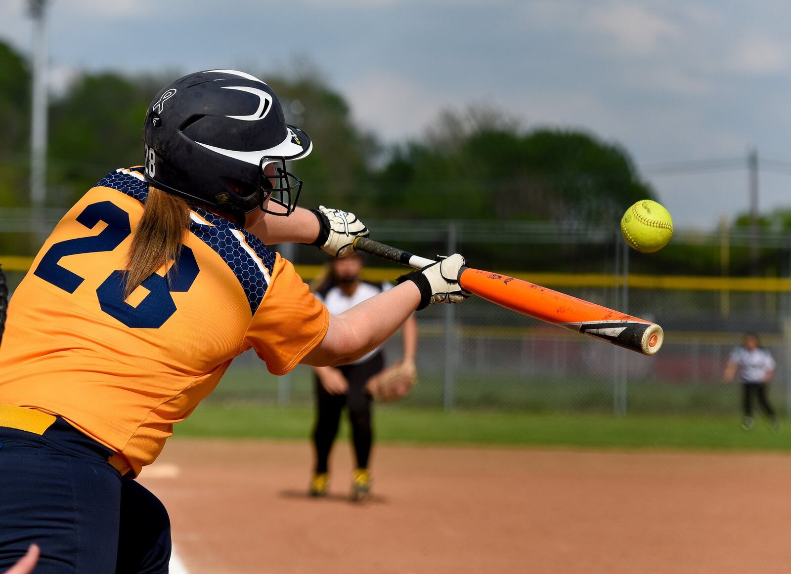 Monroe’s Mikayla Decker bunts during a 13-10 win over Franklin on May 5, 2015, at Franklin Community Park. NICK GRAHAM/STAFF