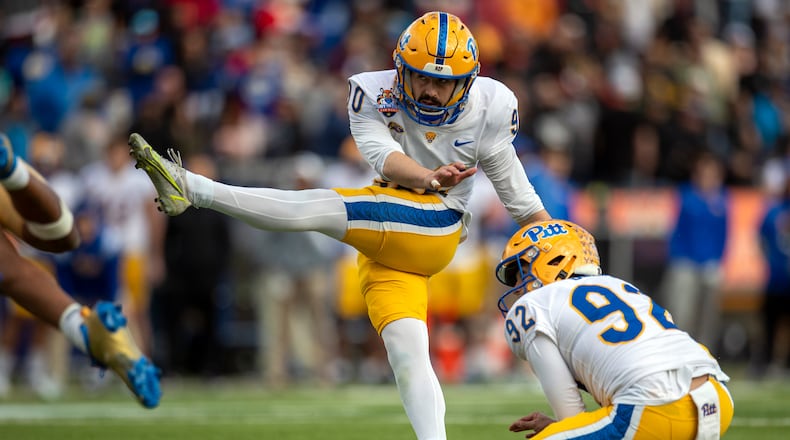 Pittsburgh placekicker Ben Sauls (90) boots the winning field goal during the second half of the Sun Bowl NCAA college football game against UCLA, Friday, Dec. 30, 2022 in El Paso, Texas. (AP Photo/Andres Leighton)