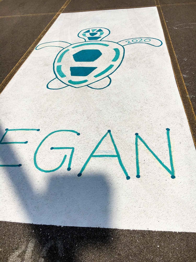 PHOTOS Lakota East seniors paint parking spots