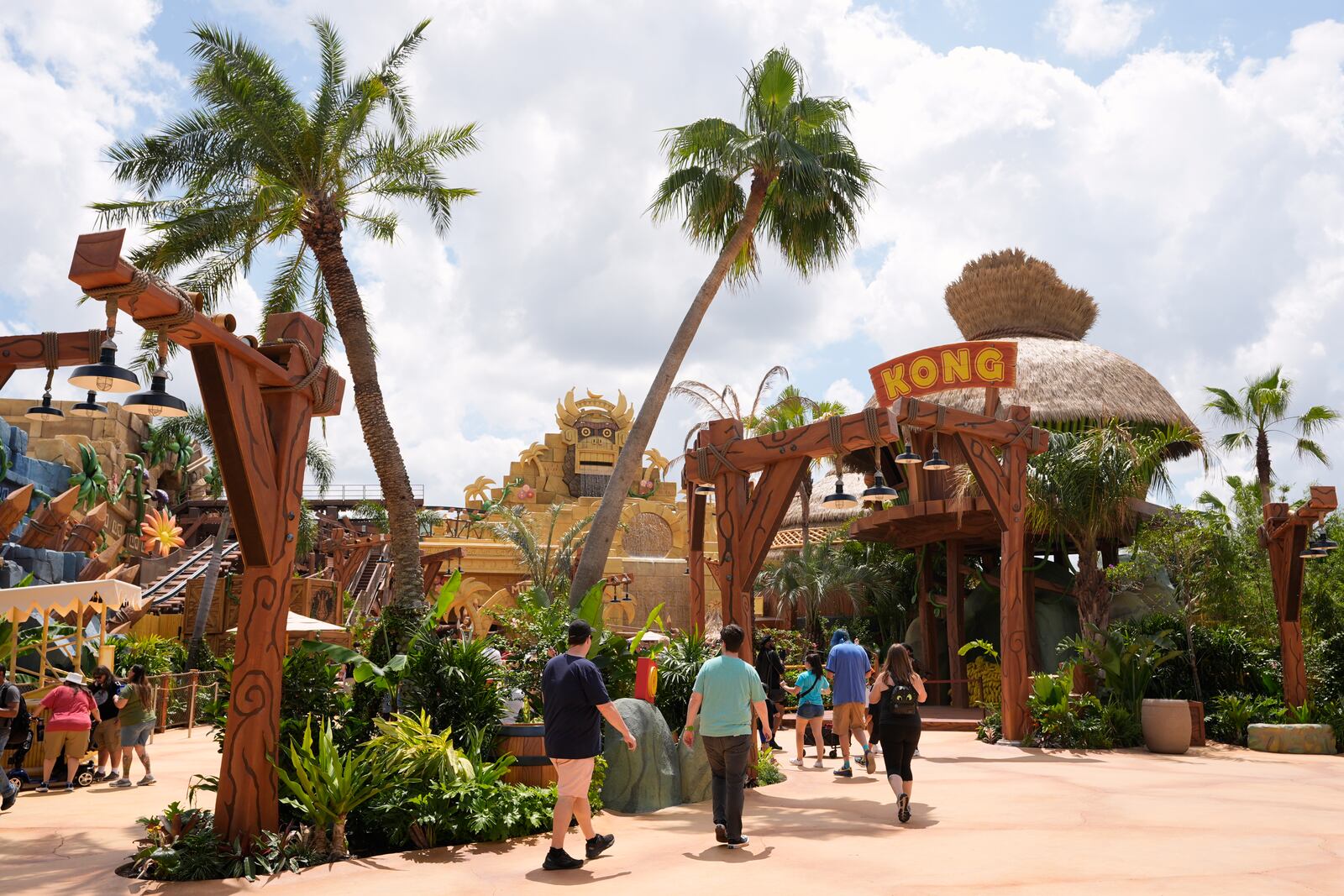 Guests stroll around the various parts of Super Nintendo World at Epic Universe at Universal Resort Orlando Thursday, April 10, 2025, in Orlando, Fla. (AP Photo/John Raoux)
