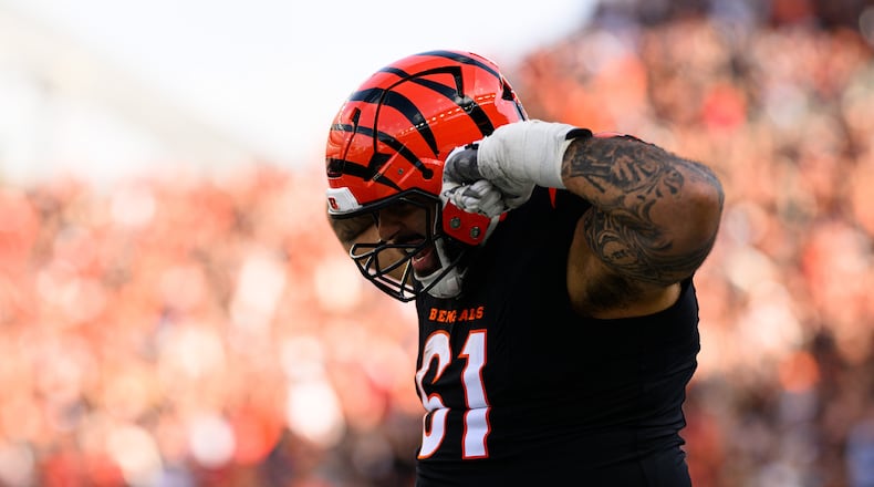 Cincinnati Bengals offensive lineman Cody Ford celebrates after a catch and run during their 37-14 victory over the Arizona Cardinals on Sunday, Dec. 28, at Paycor Stadium. JEREMY MILLER / CONTRIBUTED PHOTO
