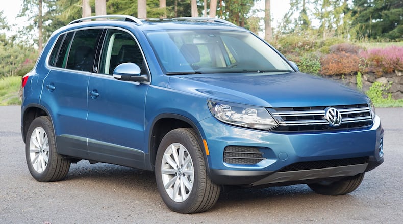 In profile, the 2017 Volkswagen Tiguan is distinguished by its raked-back windscreen, rising waistline, large side windows, and an unmistakable, trademark C-pillar at the rear. On Wolfsburg and higher trims, a distinctive ring of chrome around the side windows works to visually enhance the car. The Wolfsburg model features unique 17-inch ‘Novara’ wheels, a full power driver s seat, and Wolfsburg badging. Volkswagen photo