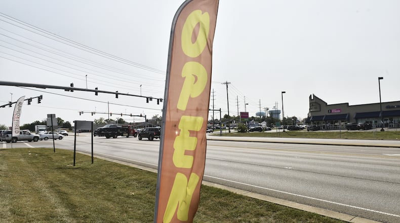 Among the several text amendments to the Middletown Development Code being considered by City Council is prohibiting certain types of large signs, blade signs and air-powered/balloon signs. Council will make a final decision on the proposed text amendments at its Oct. 6 meeting. NICK GRAHAM/STAFF