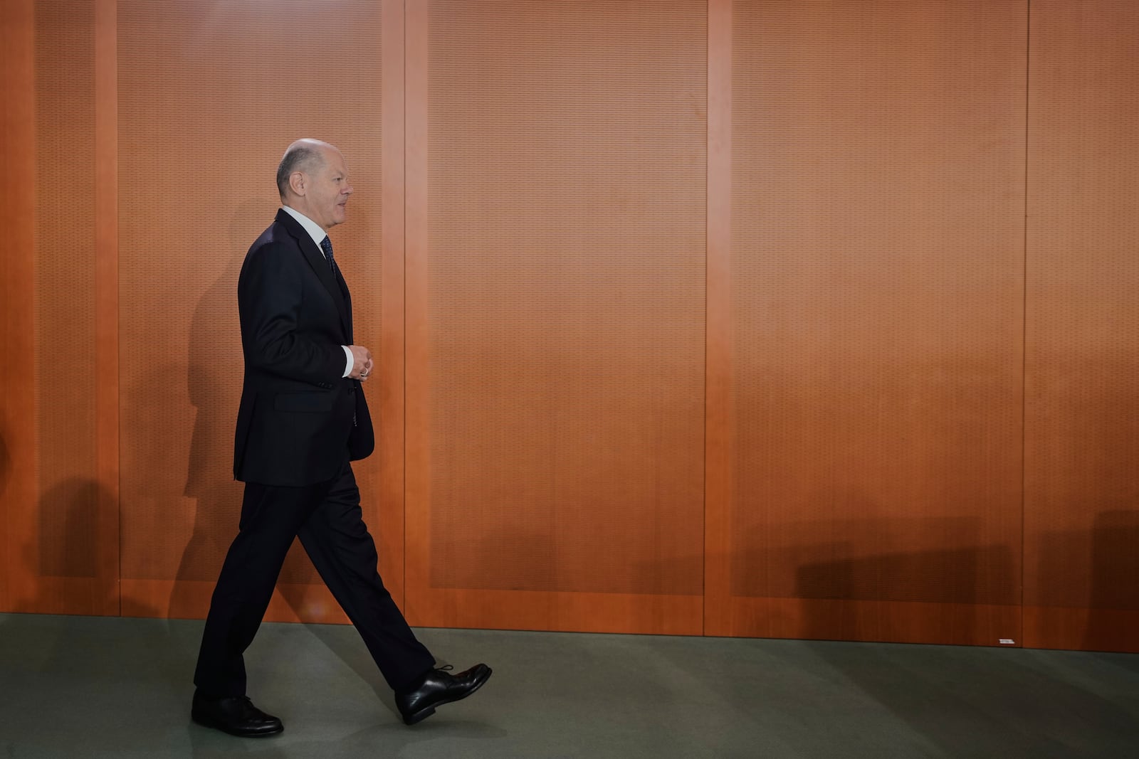 Outgoing Chancellor Olaf Scholz arrives at the last expected cabinet meeting of his government at the chancellery in Berlin, Germany, Wednesday, April 30, 2025. (AP Photo/Markus Schreiber)