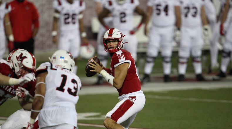 Miami quarterback A.J. Mayer looks for a receiver during a game last season vs. Ball State at Yager Stadium. Miami Athletics photo