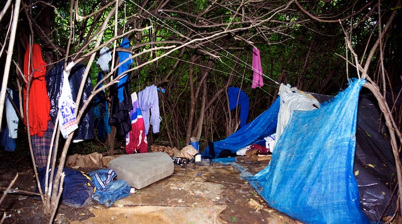 This file photo shows a camp of those experiencing homelessness, behind the Hamilton Plaza on Dixie Highway in Hamilton/Fairfield Twp. FILE