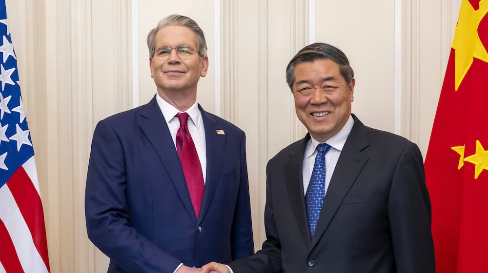 FILE - U.S. Secretary of the Treasury Scott Bessent, left, shakes hands with Chinese Vice Premier He Lifeng, right, during a bilateral meeting between the United States and China, in Geneva, Switzerland, on Saturday, May 10, 2025. (Martial Trezzini/Keystone via AP, File)