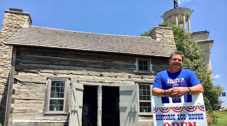 The fully restored Pioneer Log House from around 1804, which includes furnished with historical pieces, is now under the care of Hamilton Schools history teacher and docent Christopher Maraschiello. The historic Hamilton home has visiting hours on Saturdays during the summer. (Photo by Michael D. Clark/Journal-News)