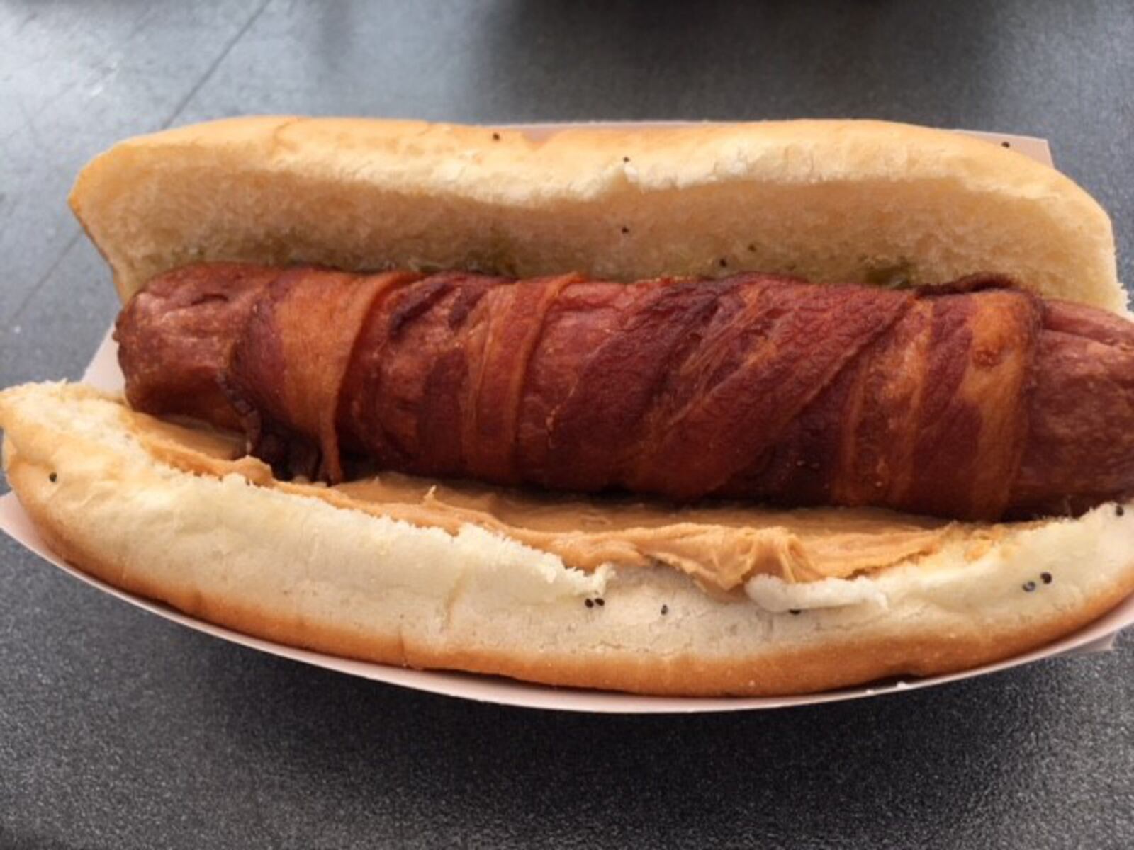 Archers bacon wrapped peanut butter and jelly hotdogs which one most creative use of bacon at BaconFest. ALEXIS LARSEN / CONTRIBUTED