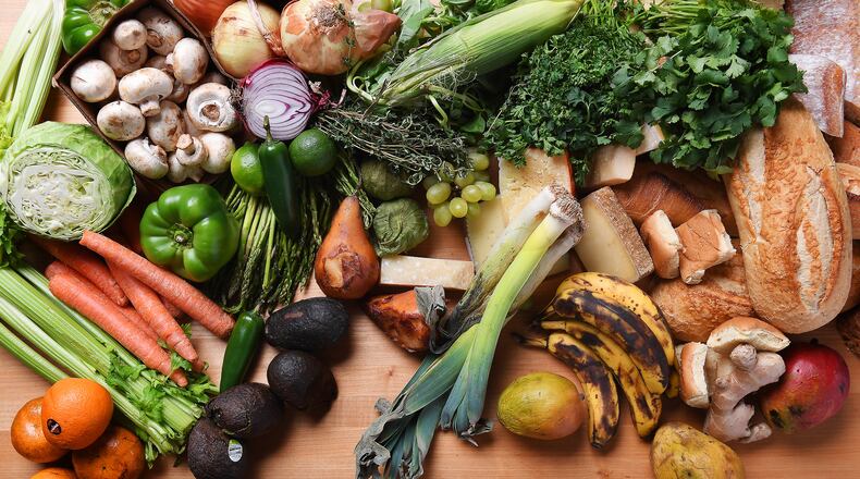 Americans waste about one pound of food per person per day, and they throw away trillions of gallons of water in the process. (Christina House/Los Angeles Times/TNS)
