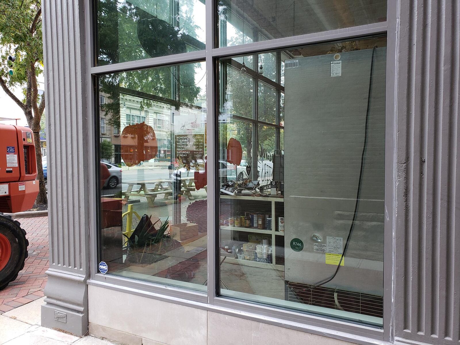 A broken window was replace dat the Almond Sister business in Hamilton in late October 2020. NICK GRAHAM / STAFF
