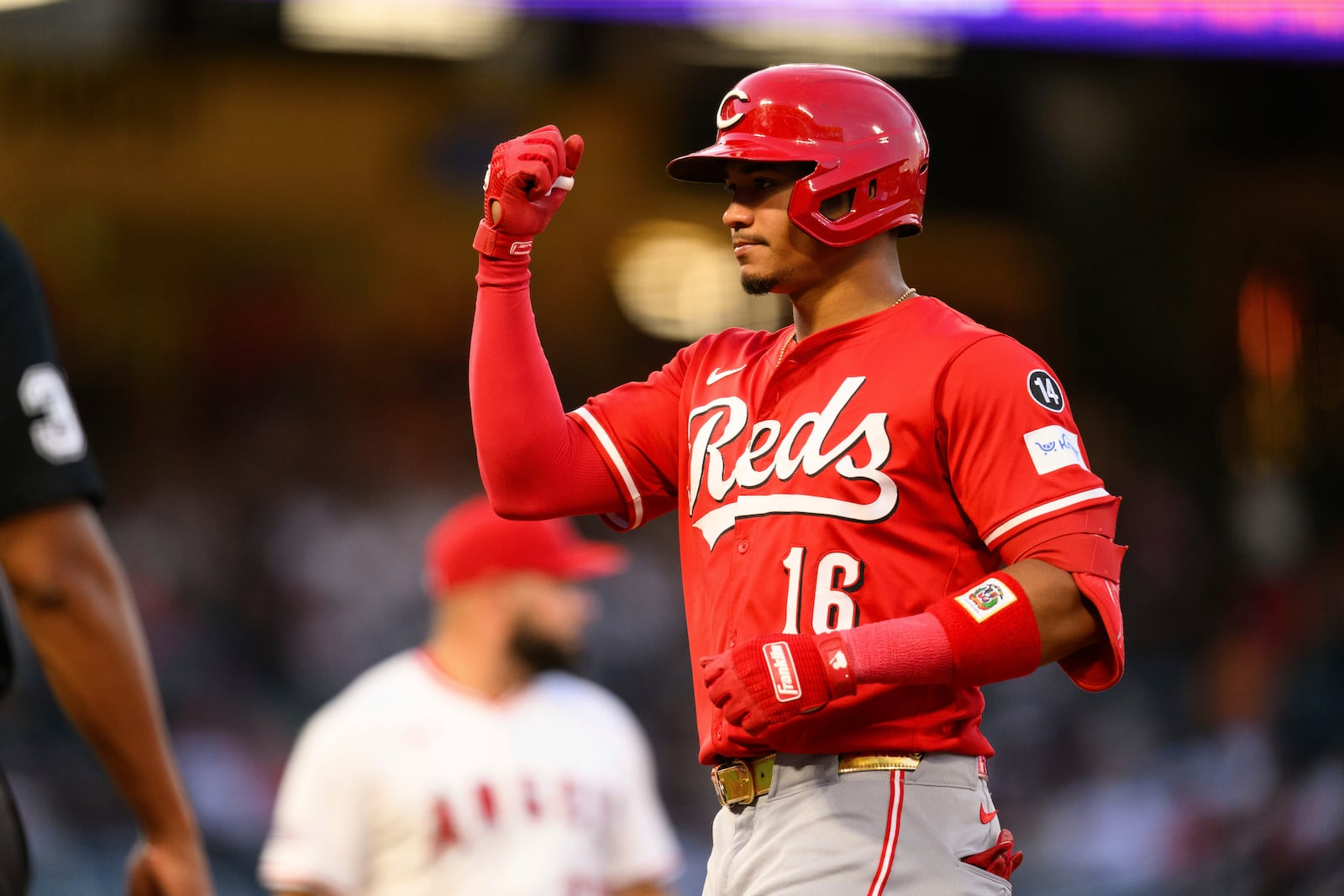 Cincinnati Reds' Noelvi Marte gestures after hitting a RBI single during the third inning of a baseball game against the Los Angeles Angels Wednesday, Aug. 20, 2025, in Anaheim, Calif. (AP Photo/William Liang)