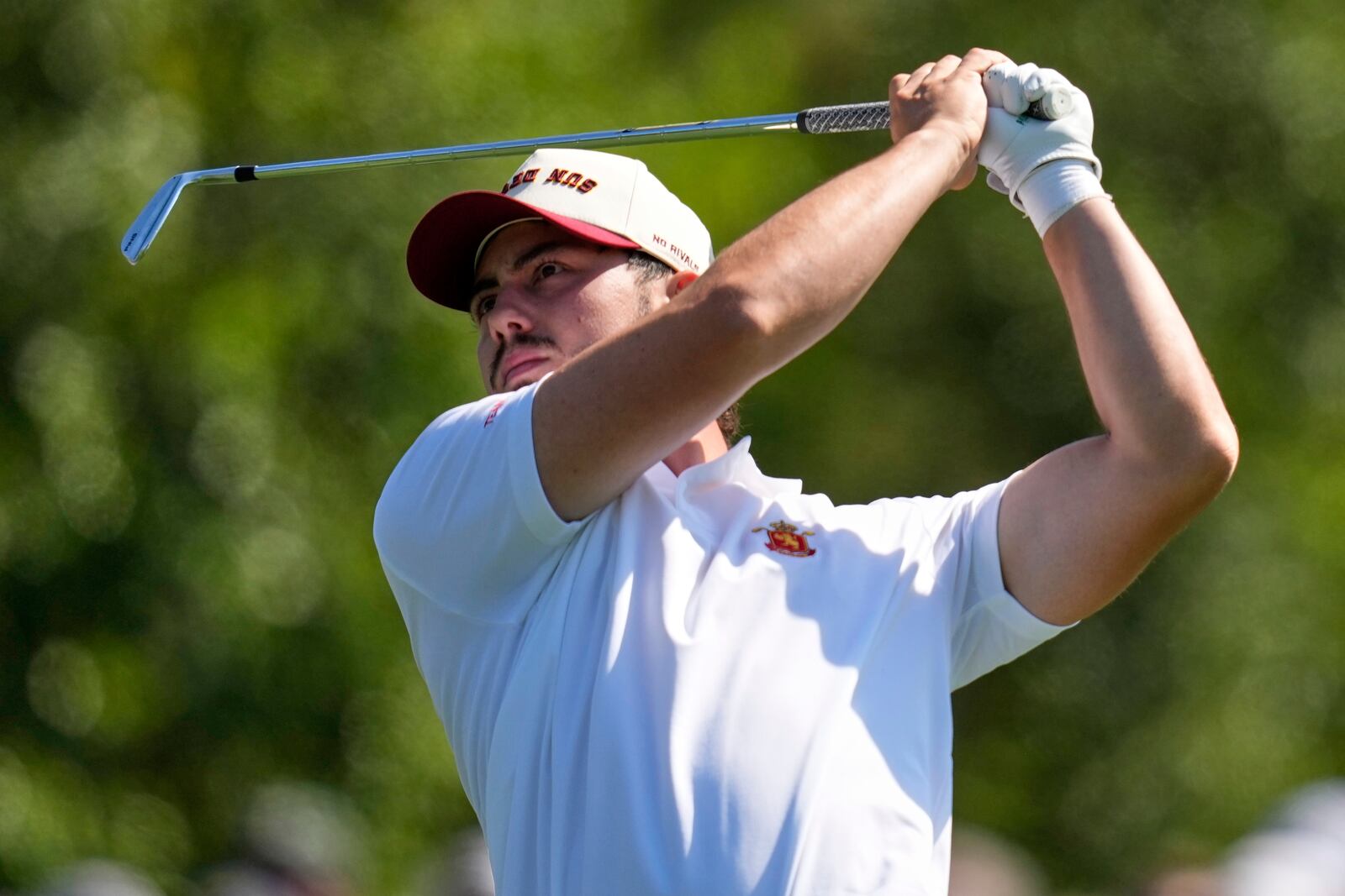 Jose Luis Ballester, of Spain, watches his tee shot on the 14th hole during the first round at the Masters golf tournament, Thursday, April 10, 2025, in Augusta, Ga. (AP Photo/David J. Phillip)