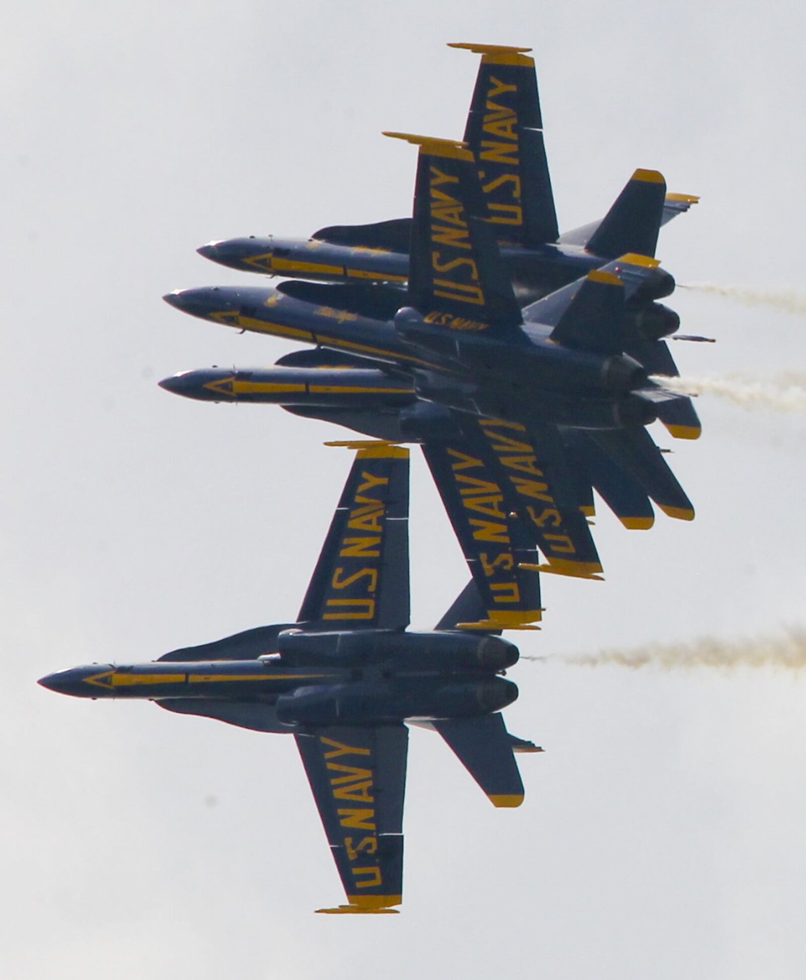 The U.S. Navy Blue Angels perform during the Vectren Dayton Air Show held at the Dayton International Airport, Sunday, June 29, 2014. GREG LYNCH / STAFF