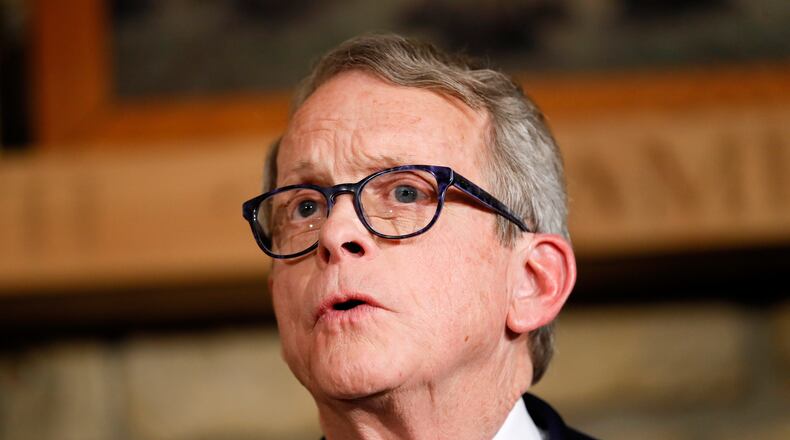FILE - Mike DeWine speaks, Jan. 14, 2019, in Cedarville, Ohio. Ohio's Health Department has backed off proposed rules that would have restricted gender-affirming care for adults. The new proposal Wednesday, Feb. 7, 2024 comes after gathering public comment on a proposal released last month. Transgender people and their healthcare providers feared the original rules would have left thousands of patients scrambling to find care — and facing health risks in the meantime. The proposed rules are also relaxed for requirements for treatment for minors, some of which was banned by a law adopted last month when the Legislature overrode Gov. Mike DeWine's earlier veto. (AP Photo/John Minchillo, Pool)