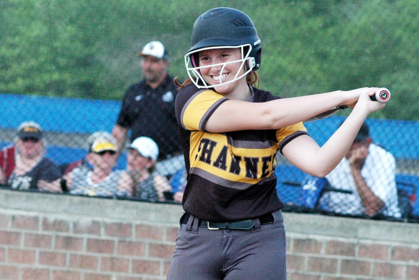 Springfield Shawnee’s Taylor Cox takes a practice swing during Saturday’s Division II district championship softball game against Monroe at Brookville. Monroe won 4-0. RICK CASSANO/STAFF