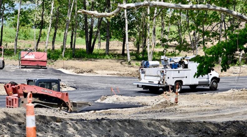 Caption: The city’s yet-to-be-named dog park is set to be completed later this summer. The park is more than just a dog park as it will be a trail head hub for the Great Miami River Trail and will connect with the bike path to Marsh Park. Pictured is the progress of the construction on May 16, 2019. NICK GRAHAM/STAFF