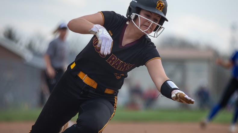Ross junior Meadow Webb slides into home during her game against Hamilton on Monday night. ADRIAN ALVIS / CONTRIBUTED