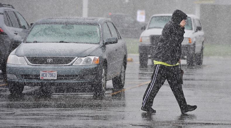 The Miami Valley saw snow, rain and hail this afternoon. /STAFF, Marshall Gorby