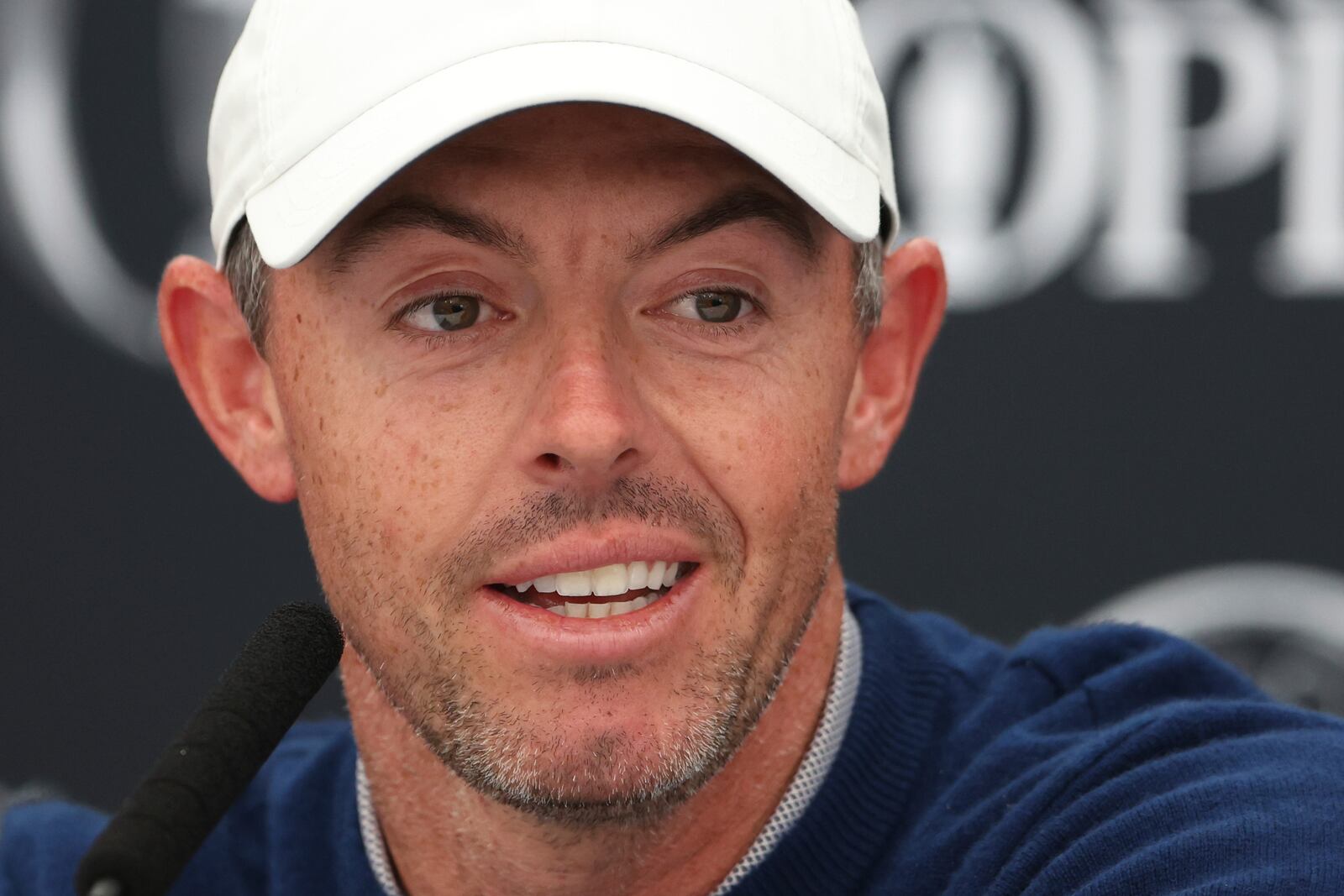 Rory McIlroy of Northern Ireland listens to a question from the media at a press conference ahead of the 2025 British Open golf championship at the Royal Portrush Golf Club, Northern Ireland, Monday, July 14, 2025. (AP Photo/Peter Morrison)