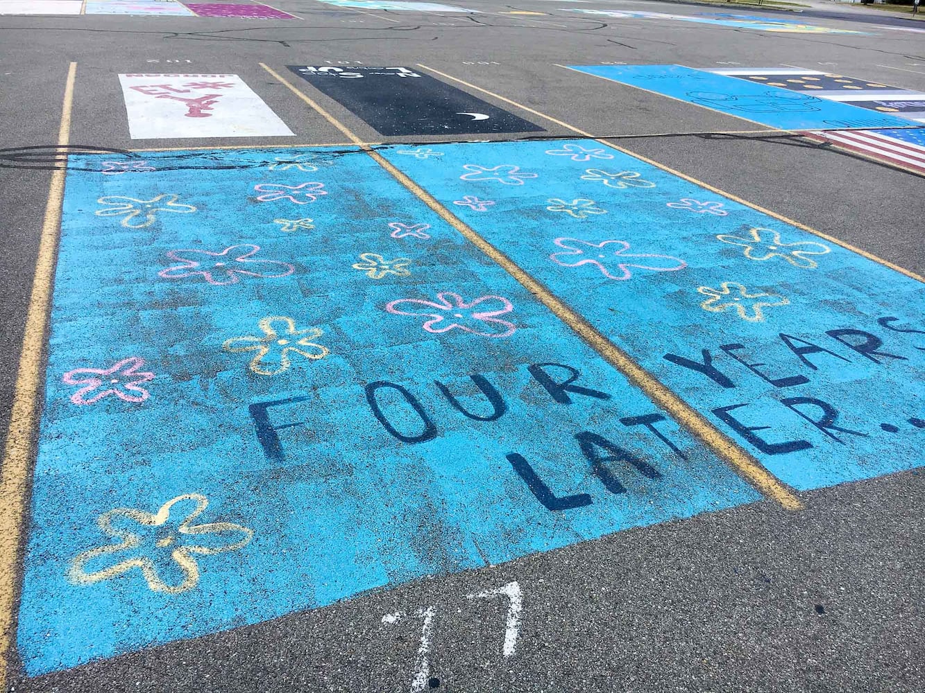 PHOTOS Lakota East seniors paint parking spots