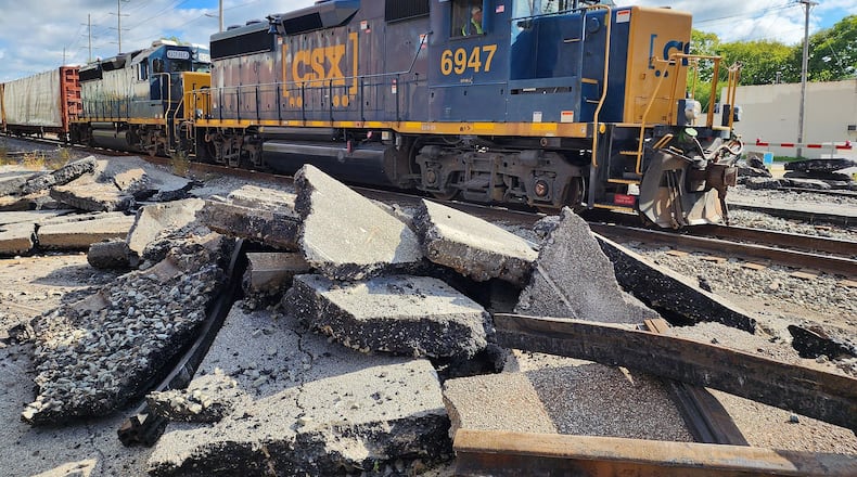 CSX Transportation has temporarily closed two railroad crossings this week (from Sept. 12 to Sept. 16, 2022) in Hamilton to replace faulty railroad ties. Pictured is work at the Heaton Street crossing. Work is also being preformed at the Butler Street crossing. NICK GRAHAM/STAFF
The Heaton Street rail crossing, between Third and Fifth streets, and the Butler Street rail crossing, between Martin Luther King Jr. Boulevard and Fifth Street, will be closed to through traffic from 7 a.m. Monday to 8 p.m. Friday.
Closure dates could fluctuate due to the complexity of required work and/or weather conditions.
