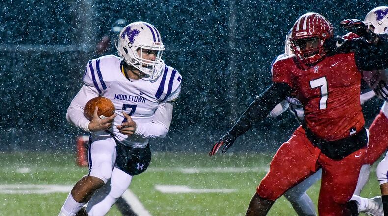 Middletown quarterback Blake Marshall carries the ball during their football game against Fairfield Friday, Oct. 27 at Fairfield Stadium in Fairfield. Fairfield won 48-0. NICK GRAHAM/STAFF