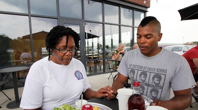 After his return from Afghanistan, Army National Guard Spc. Seth Parker and his mother, Pamela Brown-Parker, share lunch at one of Seth’s favorite restaurants, Chipotle.