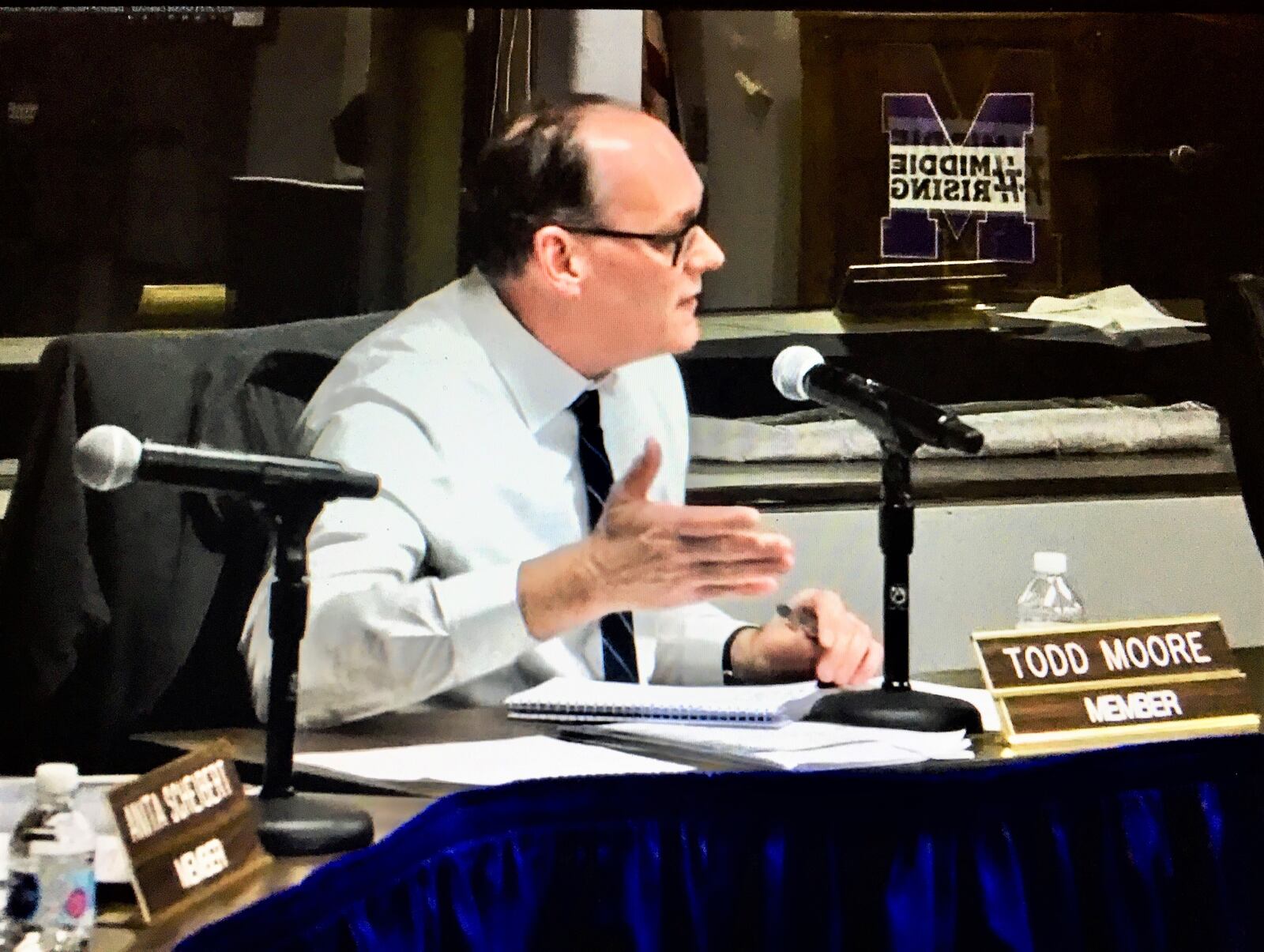 Middletown Board of Education member Todd Moore (pictured) peppered district officials - including Superintendent Marlon Styles Jr. - with questions about a $11.7 million COVID-19 school relief spending plan during the board's Monday evening meeting. The plan's four spending proposals were approved by the board, though Moore voted against one of the spending plans. Moore says the plans lacked allocation details. (Photo By Michael D. Clark\Journal-News)