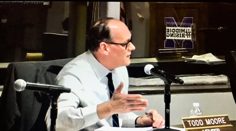 Middletown Board of Education member Todd Moore (pictured) peppered district officials - including Superintendent Marlon Styles Jr. - with questions about a $11.7 million COVID-19 school relief spending plan during the board's Monday evening meeting. The plan's four spending proposals were approved by the board, though Moore voted against one of the spending plans. Moore says the plans lacked allocation details. (Photo By Michael D. Clark\Journal-News)