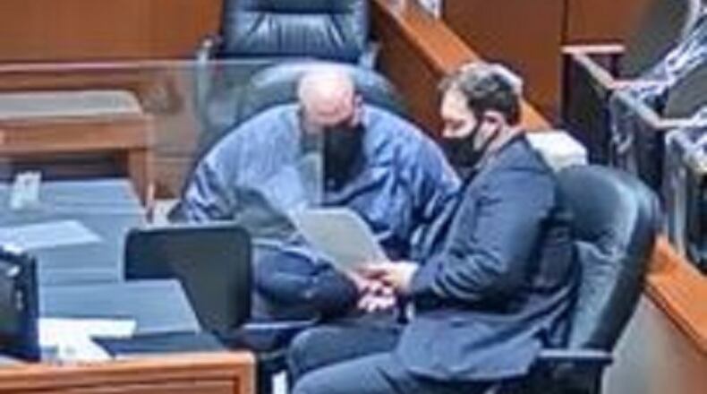 The criminal case against Edward Studebaker of Lebanon began from a referral from Google to the National Center for Missing &Exploited Children.
He is pictured reviewing documents in his case with lawyer Steve Kilburn.