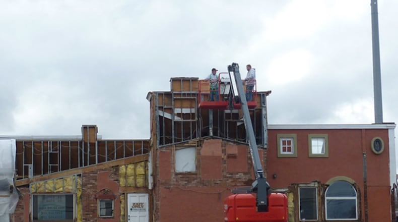 AA Plumbing work on gutting a building at 6701 Dixie Highway down to its foundation and frame. The longtime, family-owned Fairfield business will move from Homeward Way to the new site this spring. CONTRIBUTED