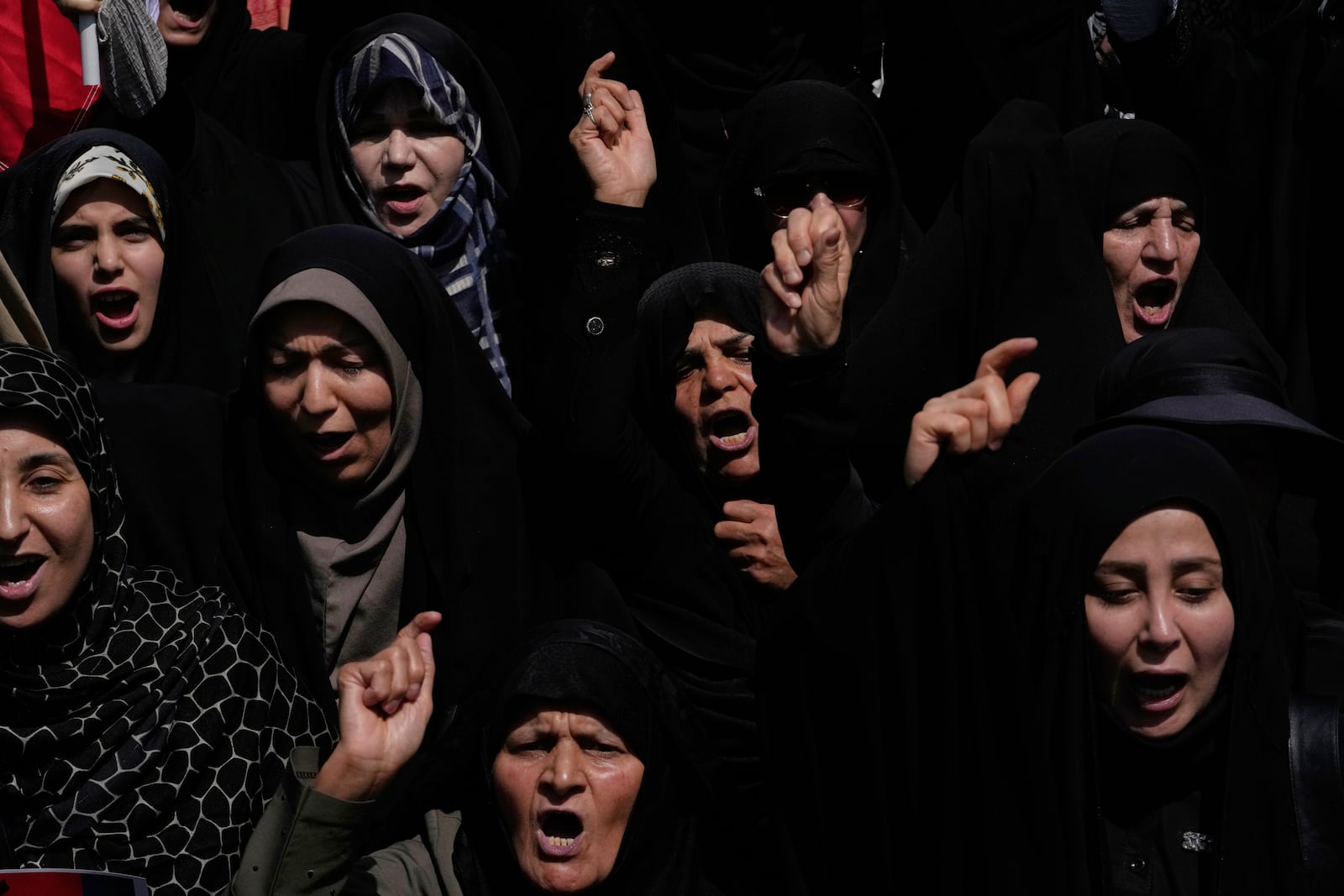 Iranian worshippers chant slogans during a protest to condemn Israeli attacks on multiple cities across Iran, after the Friday prayers ceremony in Tehran, Iran, Friday, June 20, 2025. (AP Photo/Vahid Salemi)
