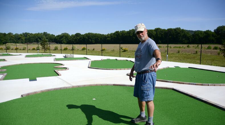 Kim Nuxhall, chair of the Joe Nuxhall Miracle League board, said the mini-golf course designed for the 150 children and adults that baseball play at the field is set to open by the end of July. The Miracle League Field is a tribute to the late Joe Nuxhall, who dedicated much of his life to helping disabled children and adults. MICHAEL D. PITMAN/STAFF
