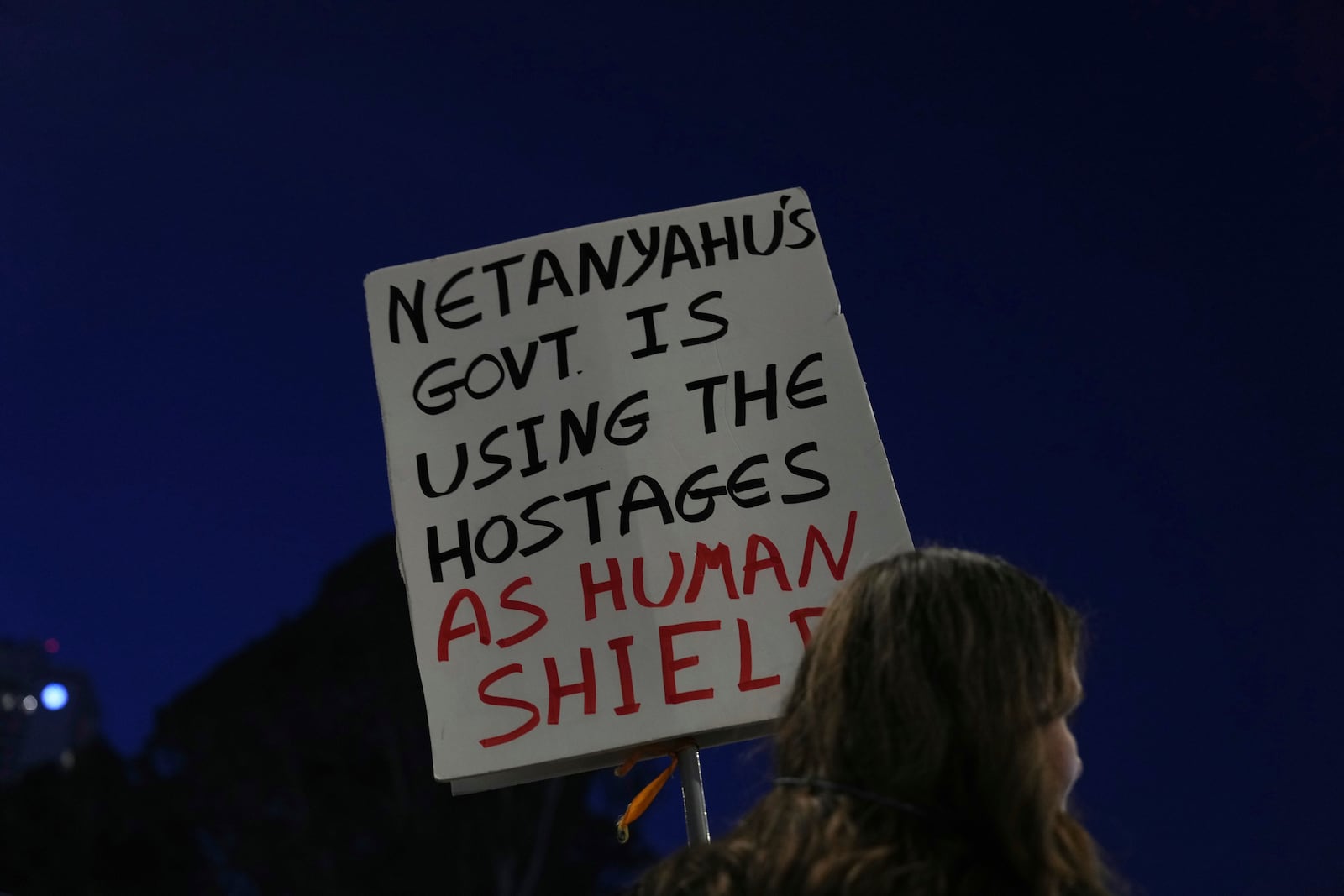 People take part in a protest demanding the immediate release of hostages held by Hamas in the Gaza Strip, in Tel Aviv, Israel, on Saturday, April 19, 2025. (AP Photo/Ariel Schalit)