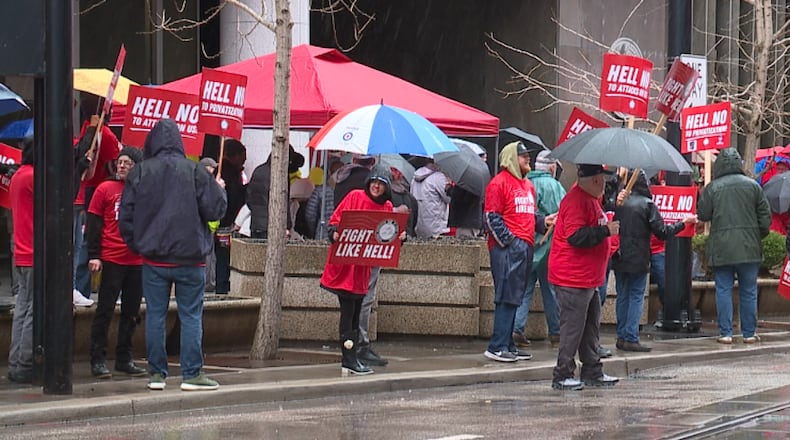 Protestors outside the John Peck Federal Building March 23 in downtown Cincinnati. WCPO