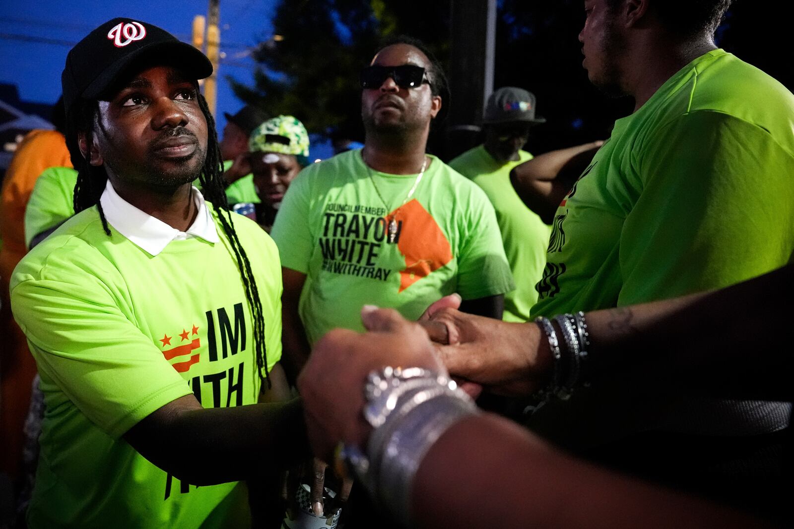 District of Columbia councilmember elect Trayon White, left, shakes hands with a supporter as he arrives to his Ward 8 special election watch party, Tuesday, July 15, 2025, in Washington. (AP Photo/Julia Demaree Nikhinson)
