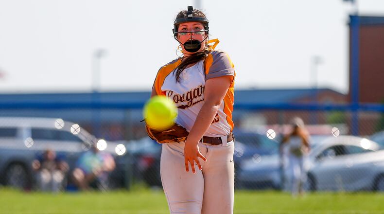 Cutline: Kenton Ridge High School junior Kylie Ropp throws a pitch during their Division II district final game against Clinton-Massie on Friday evening at Miami East High School. The Cougars won 5-3 to win their first district title since 2018. CONTRIBUTED PHOTO BY MICHAEL COOPER