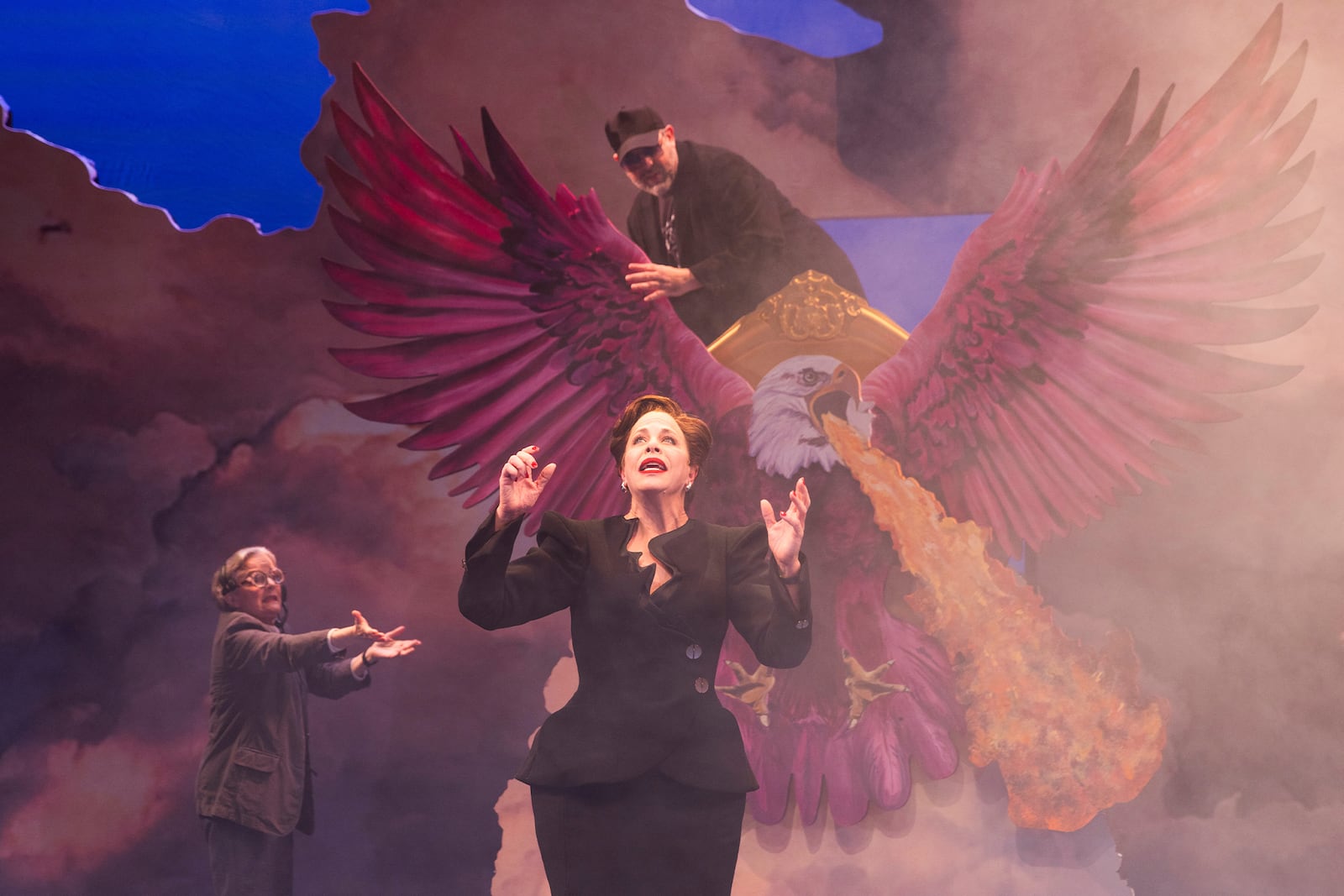 This photo provided by Theatre for a New Audience shows Jennifer Smith as Stage Manager, Jennifer Regan as Philanthropoid and Jason O’Connell as $#@%$ in "Prosperous Fools," written by Taylor Mac and directed by Darko Tresnjak. (Travis Emery Hackett/Theatre for a New Audience via AP)