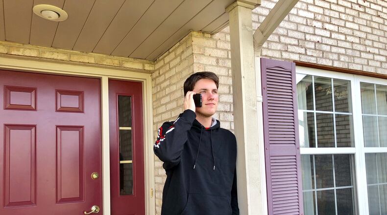 Lakota East High School senior Nick Parr is spending more time on his phone during the coronavirus shutdown as he is now forced to do his work remotely as a member of the school’s Hope Squad, designed to aid fellow classmates dealing with depression or suicidal thoughts. Parr and other Hope Squad members in Butler and Warren counties are learning the challenges of doing their volunteer work remotely. (Provided Photo/Journal-News)