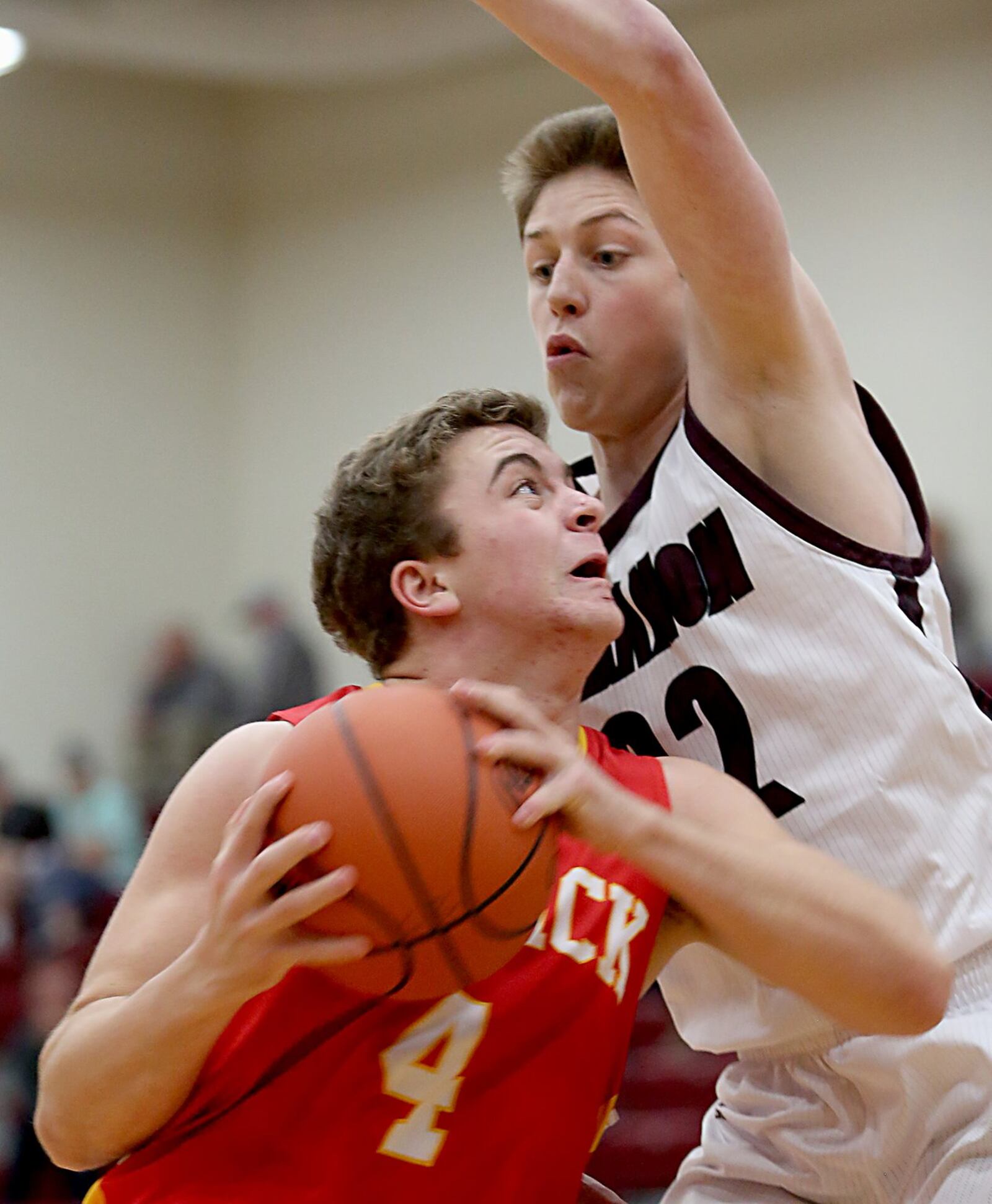 Fenwick center Sammy DeBiasi tries to drive through Lebanon guard Parker Smith during Saturday night’s game at Lebanon. CONTRIBUTED PHOTO BY E.L. HUBBARD