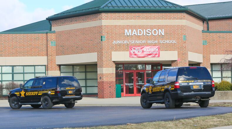 Some parents and residents in the Madison school system in Butler County have sued the district over the school boards policy plan to arm school staffers. The district was the site of a 2016 student shooting that wounded three students. STAFF FILE/2016