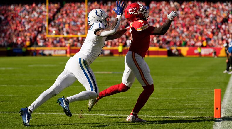 Indianapolis Colts cornerback Sauce Gardner (1) breaks up a pass to Kansas City Chiefs wide receiver Rashee Rice (4) during the first half of an NFL football game Sunday, Nov. 23, 2025, in Kansas City, Mo. (AP Photo/Charlie Riedel)