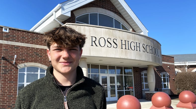 Ross High School senior and academic star Kenneth Rakes, who is one of only five Ohio students to be a U.S. Presidential Scholar in Career Technical Education finalist, has also helped feed thousands of area families through a student-run food pantry operation.  (Photo by Michael D. Clark/Journal-News)