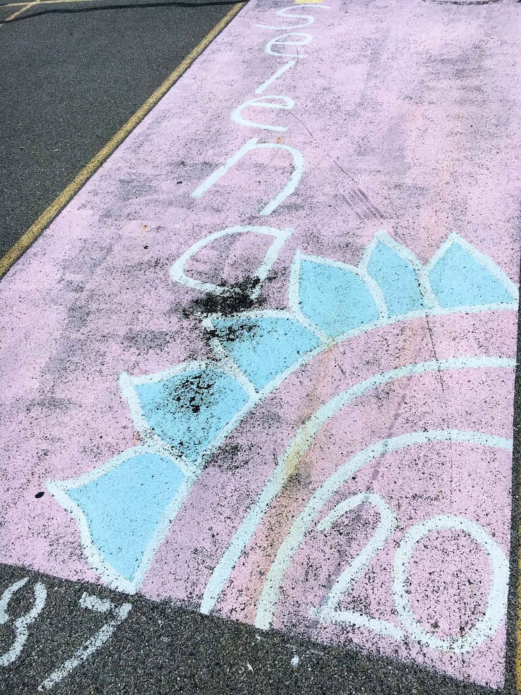 PHOTOS Lakota East seniors paint parking spots