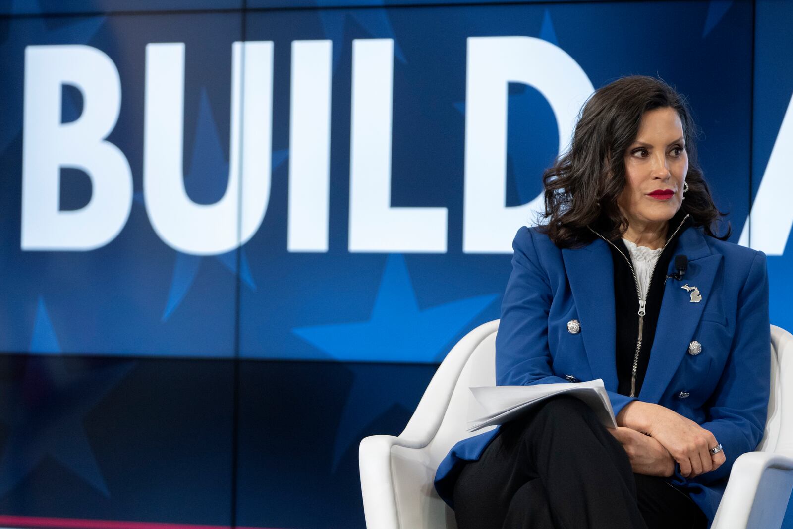 Michigan Gov. Gretchen Whitmer speaks with former television journalist Gretchen Carlson, not shown, at an event on Wednesday, April 9, 2025, in Washington. (AP Photo/Mark Schiefelbein)