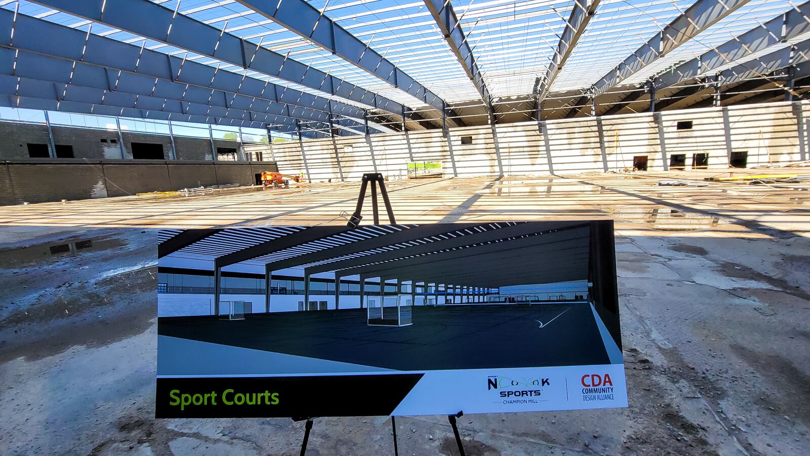 Media was invited to tour the Spooky Nook Sports Champion Mill complex under construction Friday, April 30, 2021 in Hamilton. The sports complex side and convention and hotel space combined will be over 1 million sq. feet when completed. Mill One, pictured, will feature a fitness center, climbing and adventure center, hardwood courts, sports courts, turf fields and more. Mill Two by the river is the conference center and will feature 233 hotel rooms, 16 conference rooms and 60,000 sq. feet of tenant/ lease space. NICK GRAHAM / STAFF