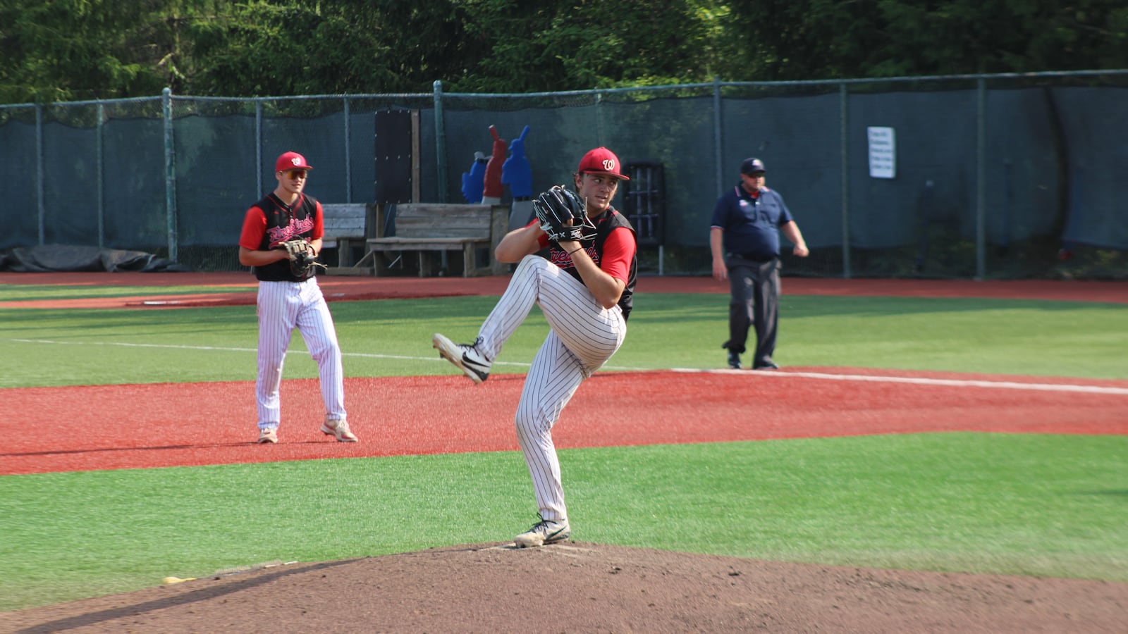 Lakota West senior pitcher Tucker Wilburn winds up during the Firebirds' 1-0 regional semifinal win over Olentangy Liberty at Nischwitz Stadium on Tuesday. JACOB BENGE