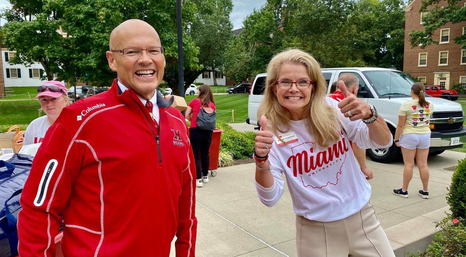 Thousands of students and their families flooded Miami University’s main campus Friday as part of the annual migration marking the new school year. Joining in were Miami University President Gregory Crawford and his wife, Miami ambassador and Adjunct Physics Professor Renata Crawford. (Photo by Michael D. Clark/Journal-News)