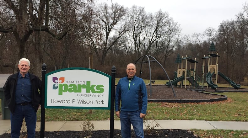 Steve Wilson, right, is the grandson of former Hamilton city manager Howard F. “Hack” Wilson, recently donated funds to the Hamilton Parks Conservancy for a new sign at the Howard F. “Hack” Wilson Park. At left is Steve Timmer, Hamilton Parks Conservancy director. The two-acre park located at North Eastview Parkway at Carter Terrace features a playground. ED RICHTER/STAFF